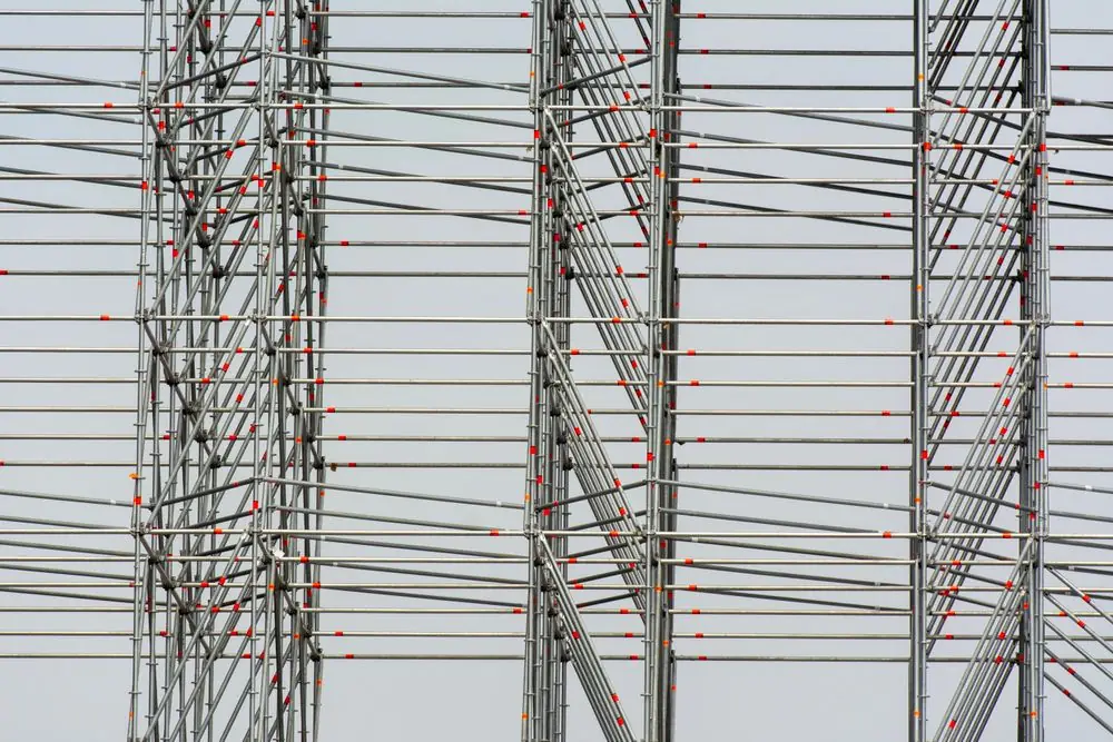 Close-up of a galvanized steel ringlock scaffolding system with rosette connections